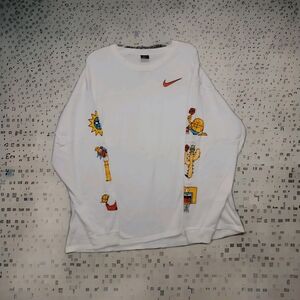 Nike Exploration Series Basketball Long Sleeve Tee in white cotton. 